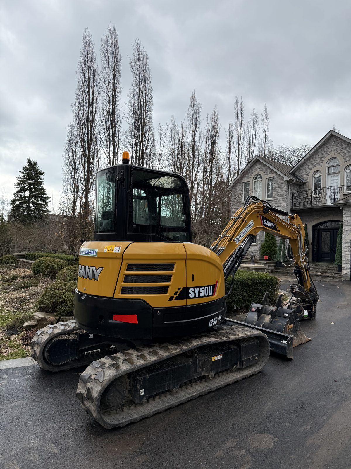 Mini excavator delivered to a residential job in the west GTA