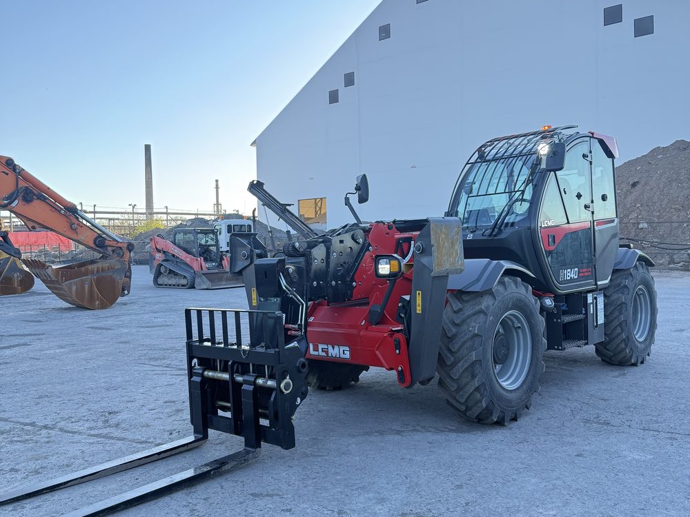 Telehandler and lifts lined up at the yard